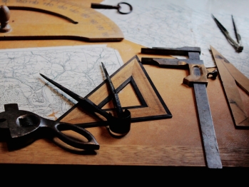 Drafting instruments on top of a table